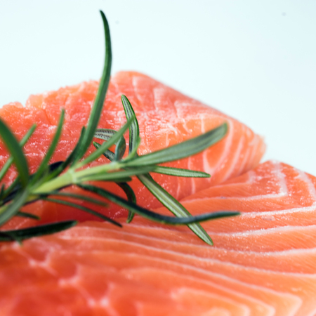 Fillet of salmon isolated on white backgroundの写真素材