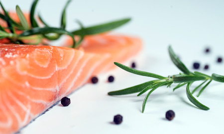 Fillet of salmon isolated on white backgroundの写真素材
