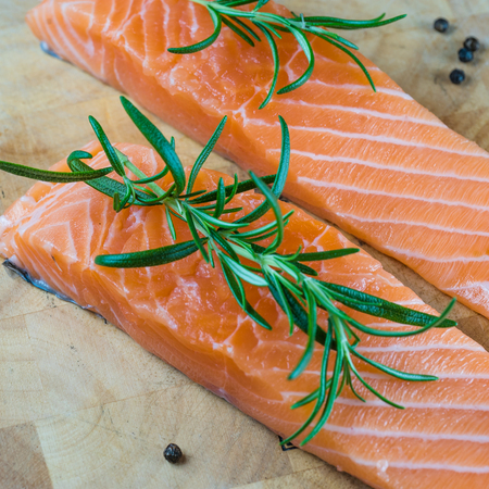 Fresh salmon on the cutting board.の写真素材