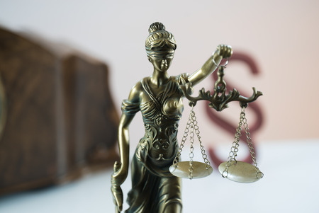 Law symbols on bright background.