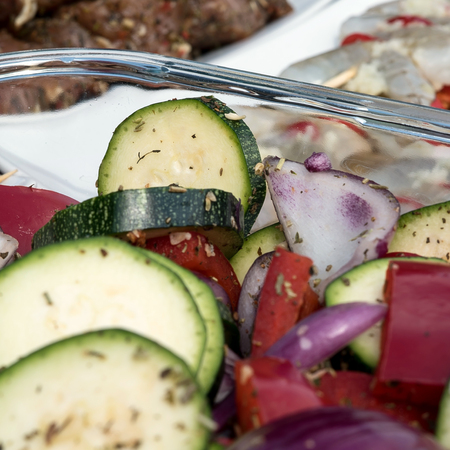meat and vegetables prepared for barbecueの写真素材