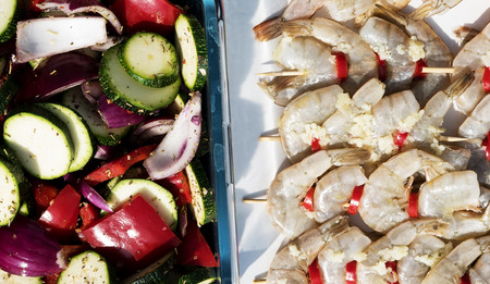 Shrimp kebabs with chili peppersの写真素材