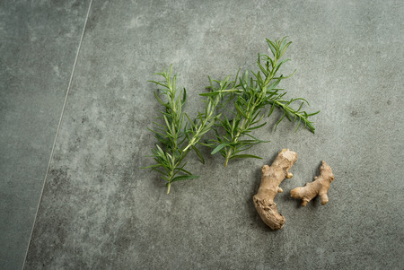 Selection of spices, herbs and greens. Gray stone background., Copy space.の写真素材