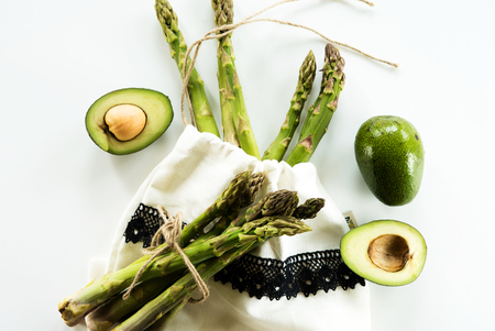 Fresh green asparagus and avocado