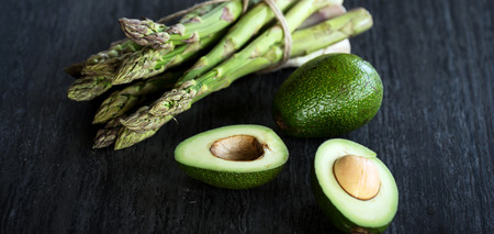 Fresh green asparagus and avocado