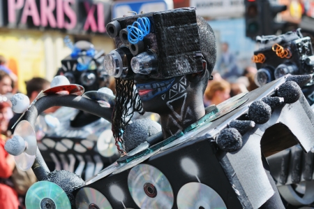 BRUSSELS, BELGIUM-MAY 19: An unknown participant demonstrates his costume of robot during Zinneke Parade on May 19, 2012 in Brussels. This parade is a biennial urban artistic and free-attendance event with theme for year 2012 Disorder or Chaosのeditorial素材