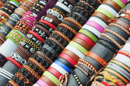 Artisan bracelets on tourist market in different countriesのeditorial素材