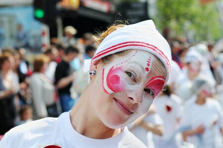 BRUSSELS, BELGIUM-MAY 19: Unidentified participant shows pink and white personage during Zinneke...