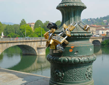 TURIN, ITALY-MAY 9: Love padlocks on embankment of river Po on May 9, 2008 in Turin. In Europe this tradition started in beginning of 2000s.のeditorial素材