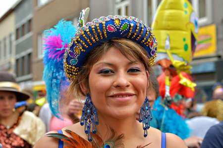 HALLE, BELGIUM-MARCH 30, 2014  Member of Bolivian team in national costume participates in defile during yearly Halle Carnivalのeditorial素材