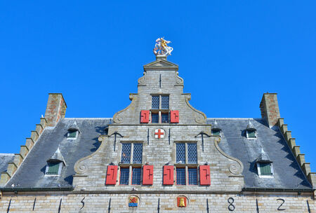 Exterior of building constructed in 14th century in historical centre of city Middelburg in province Zeeland, Netherlandsのeditorial素材
