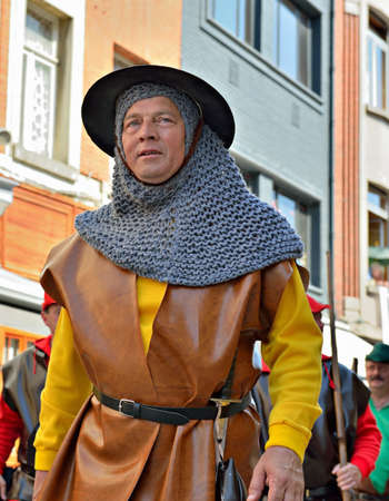 HALLE, BELGIUM-JUNE 8, 2014: Participant of Mariaprocessie on streets of historical center of the city. This is the yearly procession in honor of Mary and Black Madonna of Halle.のeditorial素材
