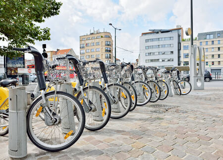 BRUSSELS, BELGIUM-AUGUST 29, 2014: Yellow bicycles of self-service Villo for rent. Automated system is available all days and hoursのeditorial素材