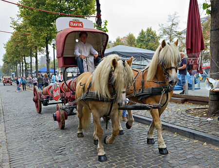 BRUSSELS, BELGIUM-SEPTEMBER 06, 2014: Parade of beer manufacturers in frame of Belgian Beer Weekend 2014 starts on Quai aux Briquesのeditorial素材