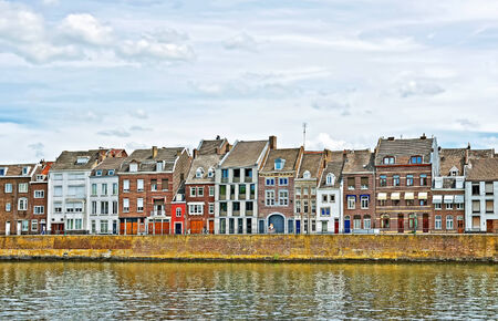 Panorama of typical houses on riverside of Maastricht, Netherlandsのeditorial素材