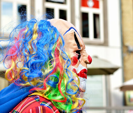 HALLE, BELGIUM-OCTOBER 25, 2014: Unidentified participant shows his clown personage during Halloween animations on Grand Place of the cityのeditorial素材