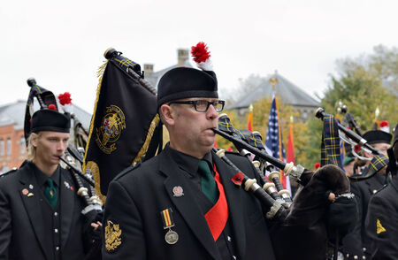 YPRES, BELGIUM-NOVEMBER 11, 2014: Participants of Poppy Parade commemorating 100 years of World War...