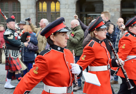 YPRES, BELGIUM-NOVEMBER 11, 2014: Participants of Poppy Parade commemorating 100 years of World War I march from Grand Place to Porte de Menin or Gates of Meninのeditorial素材