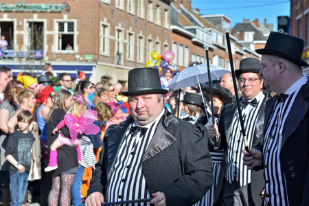 NIVELLES, BELGIUM-MARCH 03, 2014: Group in fancy dresses participates in defile during yearly carnival in Nivellesのeditorial素材