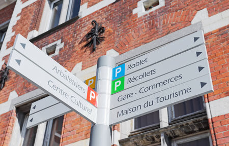 NIVELLES, BELGIUM-MARCH 03, 2014: Direction signs for tourists in historical center of city. This is one of mostly popular visiting sites for tourists in the cityのeditorial素材