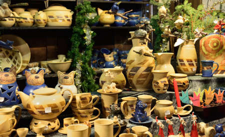 LEIPZIG, GERMANY-DECEMBER 20, 2014: Various artisan decorations sold outdoors in temporary shop on Christmas market during celebrationsのeditorial素材