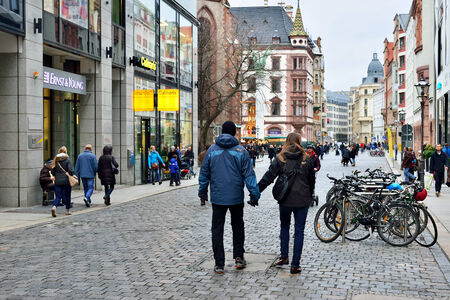 LEIPZIG, GERMANY-DECEMBER 21, 2014: People walk to Christmas market in historical centre of city. Christmas Market is one of main attractions for tourists and local people during winter holidaysのeditorial素材