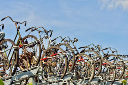 HAGUE, NETHERLANDS-AUGUST 01, 2014: Bicycles parked on street in modern center of Hague
