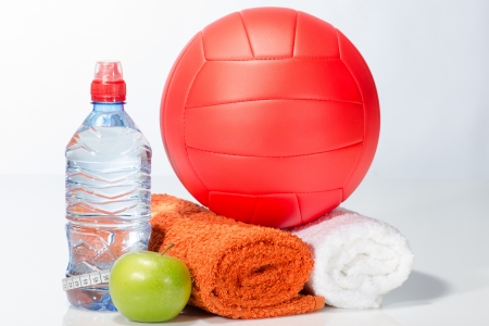 Fitness equipment  water, apple, towels, volley ballの写真素材