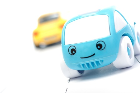 Blue toy car against white backgroundの写真素材