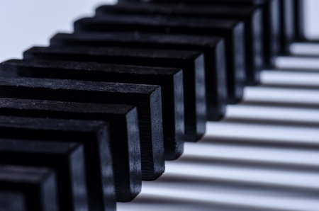 Black dominoes and shadows on white background
の写真素材