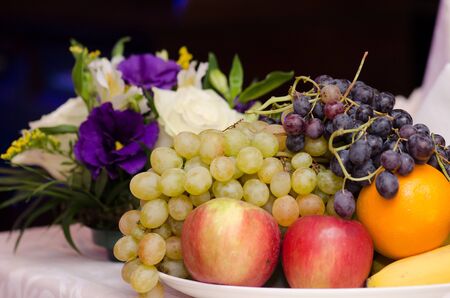 Fruits and flowers for wedding tableの写真素材