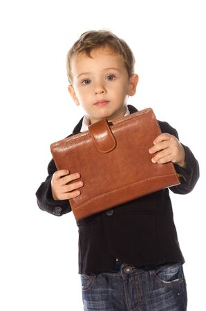 Portrait of young child with an notebook against white background
の写真素材
