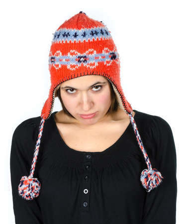 Portrait of beautiful young woman with a funny knitted hat