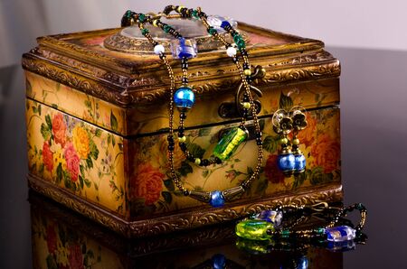 Handmade jewellery necklace and earings presented on jewellery boxの写真素材