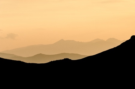 Light of sunset on high mountains Transalpina