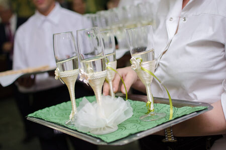 Champagne glasses on a tray for weeding
