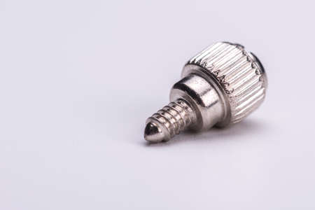 Computer screw  against white backgroundの写真素材