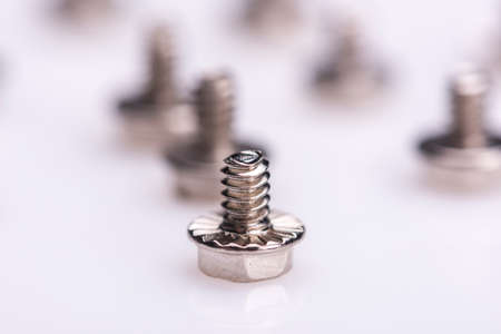 Computer screws against white backgroundの写真素材