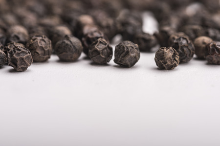 Peppercorns background with selective focusの写真素材