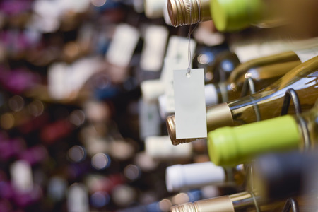 Bottles of wine inside a wine barの写真素材