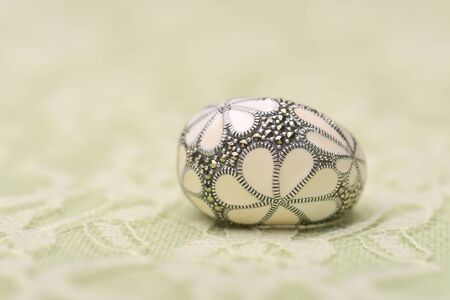 White stone silver ring on textile surfaceの写真素材