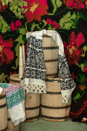 Wooden wine kegs with a traditional arrangement