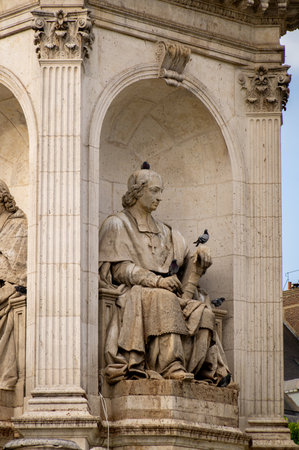 Paris, France 08 04 2023: Massillon statue by Jacques-Auguste Fauginet is a part of the Fontaine Saint-Sulpice fountain located in Place Saint-Sulpice square beside the Church of Saint-Sulpiceのeditorial素材