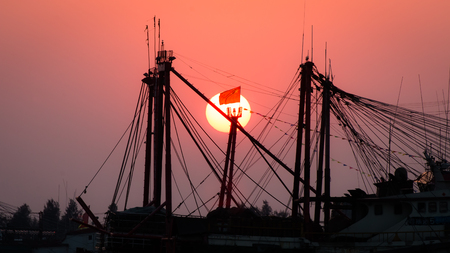 The mast under sunset at dusk