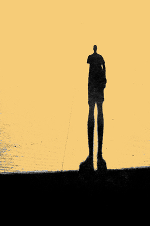 A man's shadow illustrationの写真素材