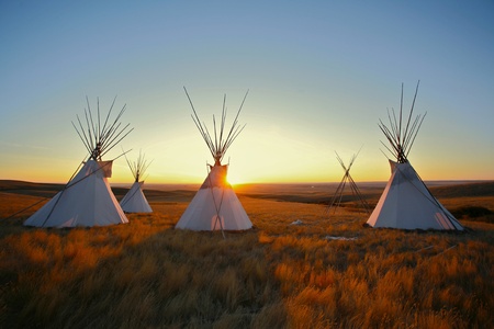 Tipis on the prairie at sunriseの写真素材