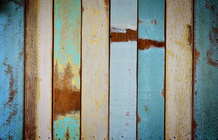 The old painted wooden wall with  variety color の写真素材