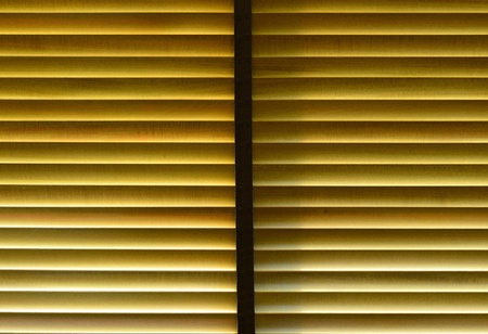 The light penetrate wooden curtain then make a nice pattern 