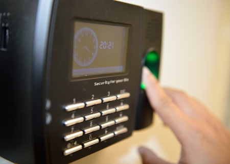 The worker use  fingerprint touch security and time checking machine.