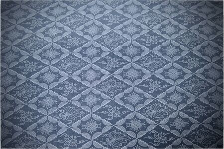 The pattern of fabric as a background.